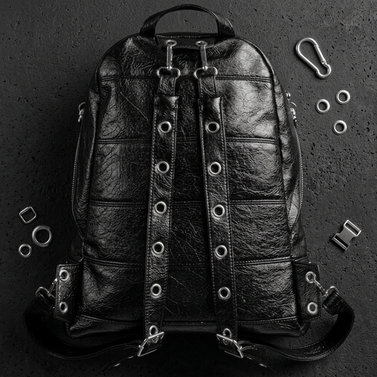 26SS Pierced Hardware Crackle Leather Backpack